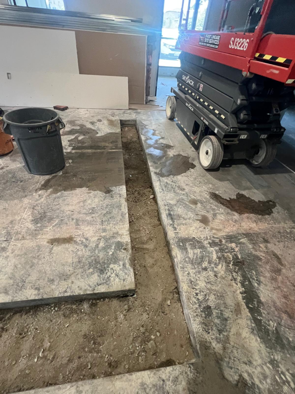 Concrete trench preparation inside Pacific Palisades property